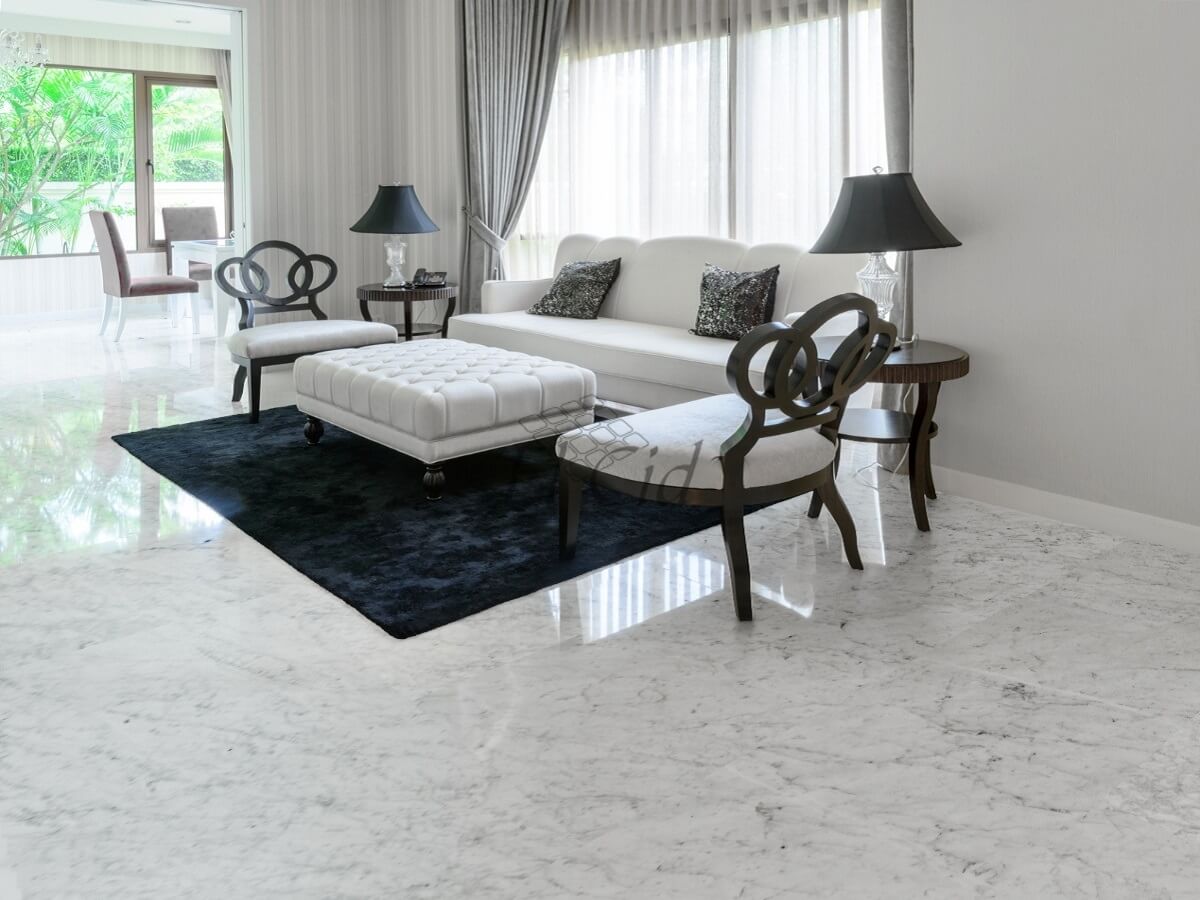 soleria sala interior de vivienda unifamiliar de mármol carrara de FABRICA EL Cid en Alicante